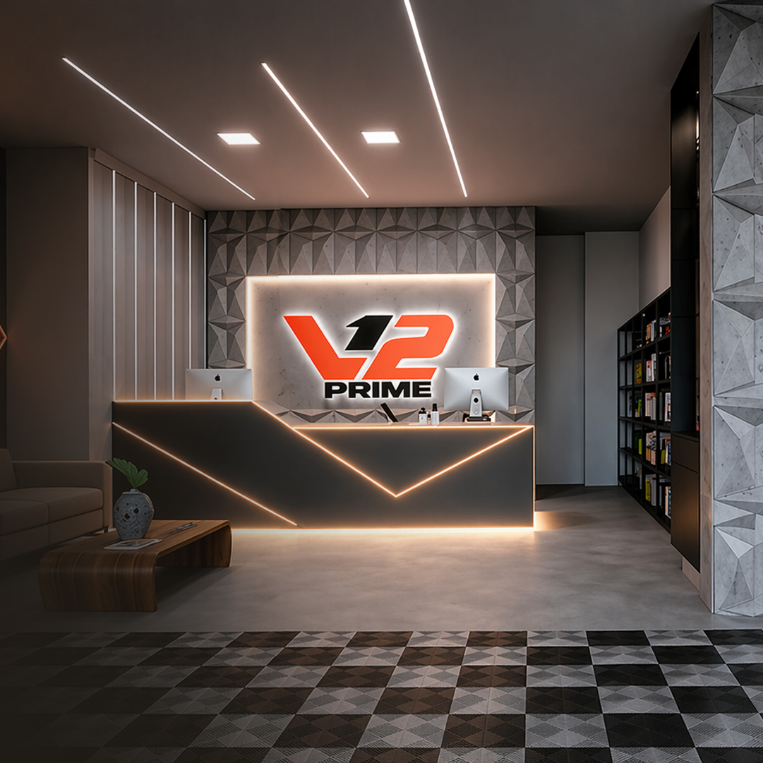 Recepção do estúdio V12 Prime com logo iluminado